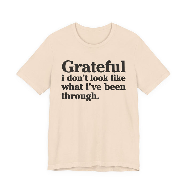 Grateful I Don't Look Like What I've Been Through — Positive Christian T-Shirt