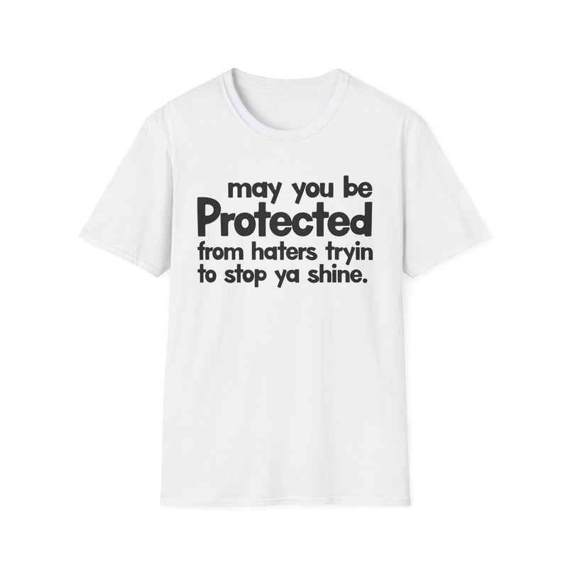 May You Be Protected From Haters Tryin To Stop Ya Shine — T-Shirt fabric detail close-up: MAY YOU BE PROTECTED FROM HATERS TRYIN TO STOP YA SHINE in bold statement lettering. Street Talk Designs protection statement apparel.