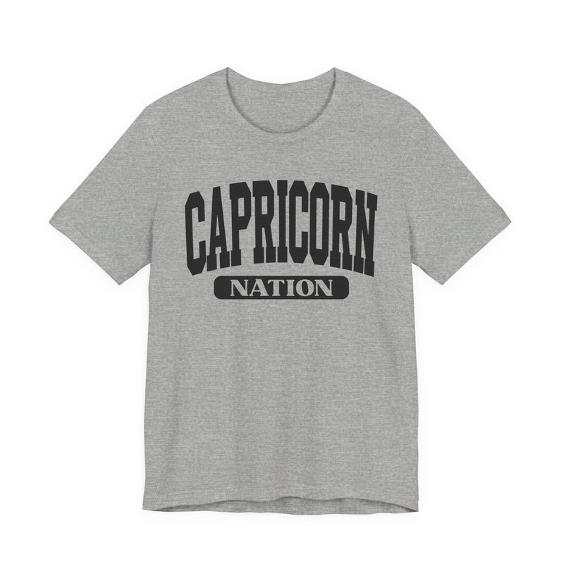 Athletic Heather t-shirt with black arched CAPRICORN lettering and a NATION pill badge, front view.