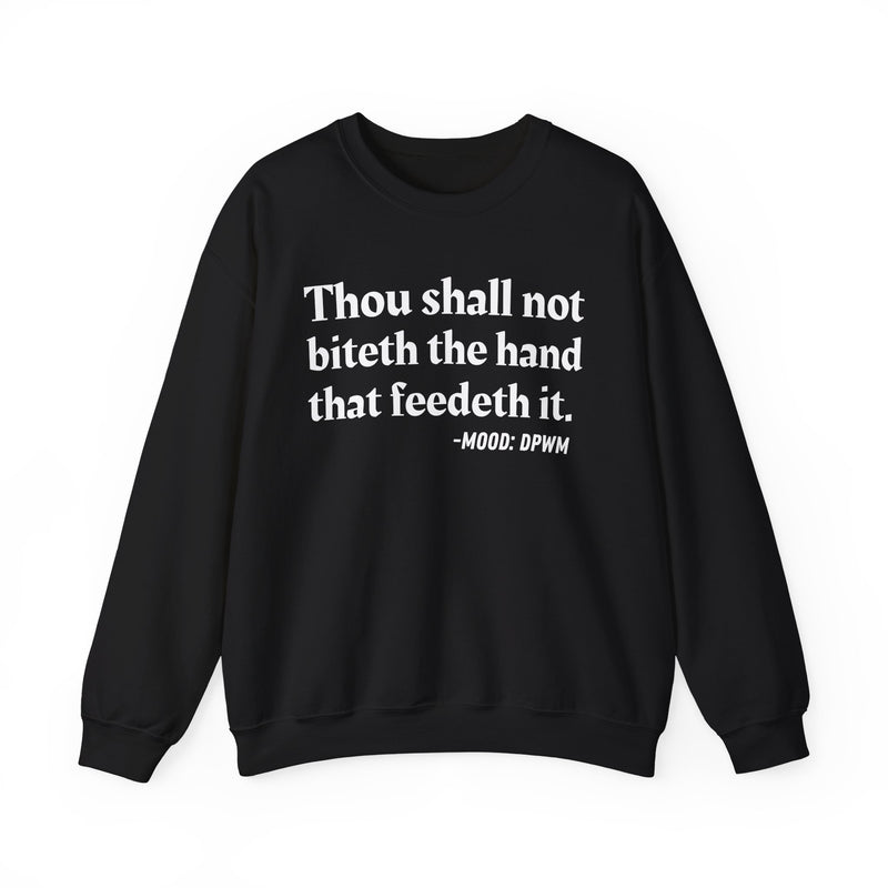 Sweatshirt with text design reading “THOU SHALL NOT BITETH THE HAND THAT FEEDETH IT”, front view