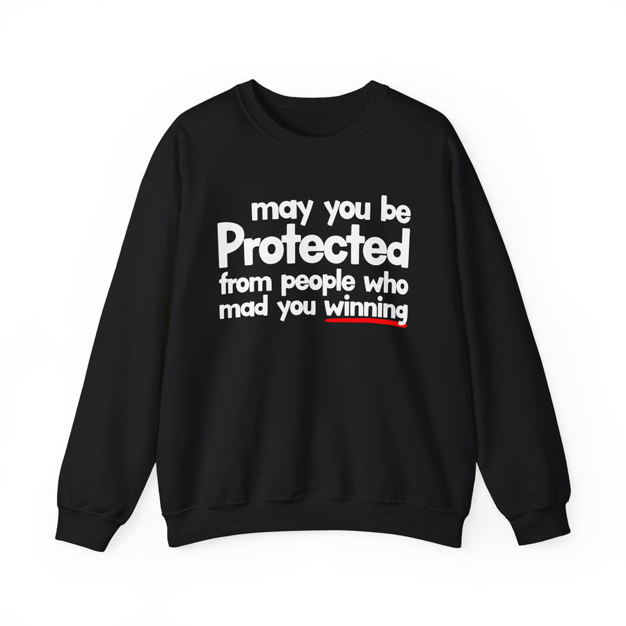 May You Be Protected From People Who Mad You Winning — Sweatshirt front view: MAY YOU BE PROTECTED FROM PEOPLE WHO MAD YOU WINNING in bold statement lettering. Street Talk Designs protection statement apparel.