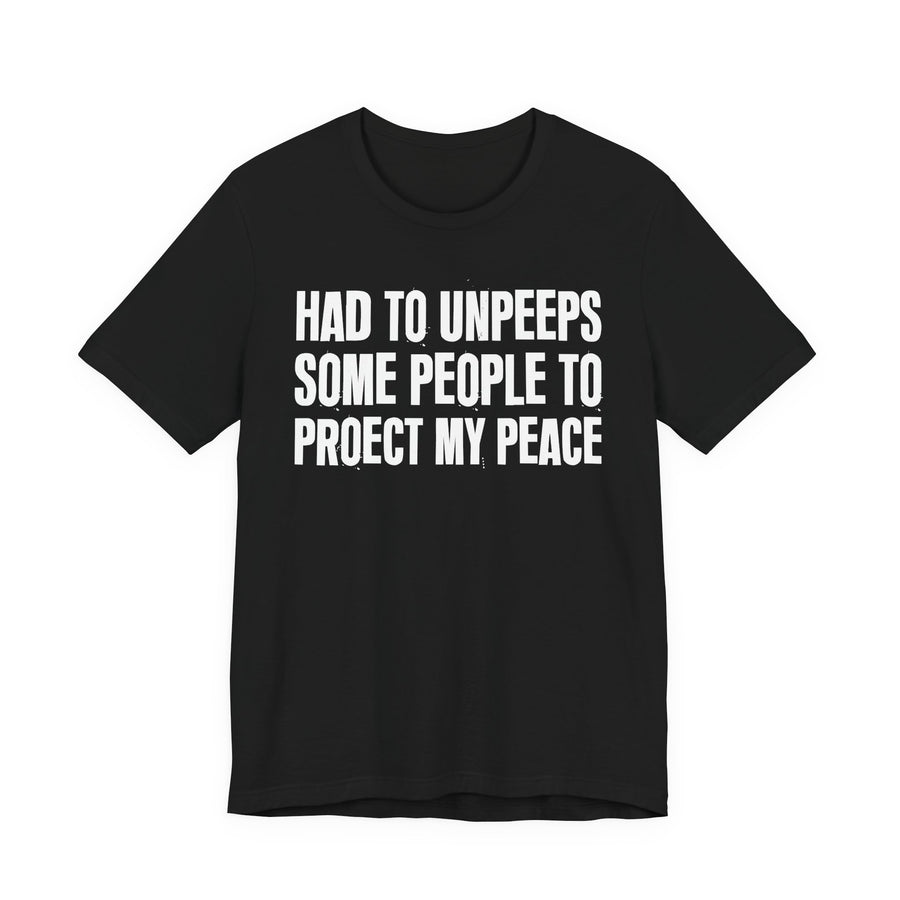 Black T-shirt with HAD TO UNPEEPS graphic, front view.