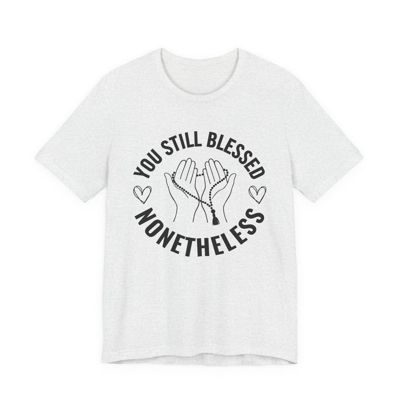 T-Shirt with “YOU STILL BLESSED NONETHELESS” statement print