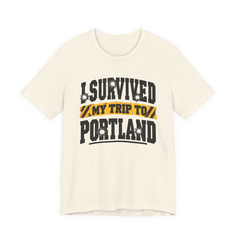 T-Shirt with collegiate lettering reading I SURVIVED MY TRIP TO PORTLAND, front view.