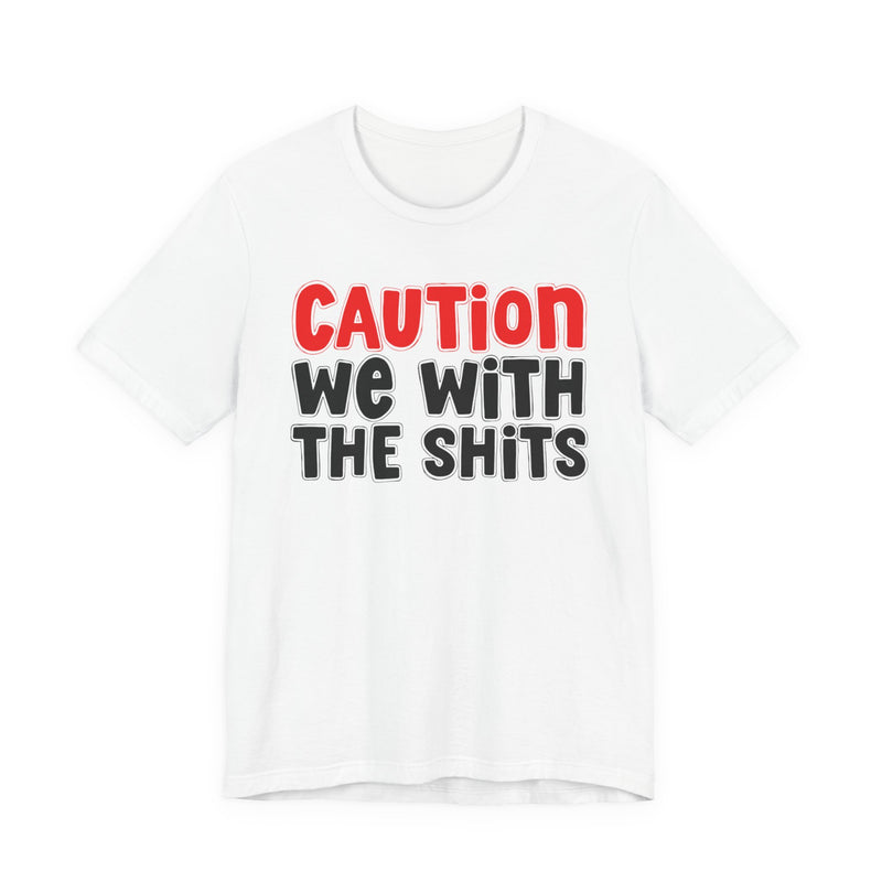 T-Shirt in White with lettering reading "CAUTION WE WITH THE SHITS", front view.