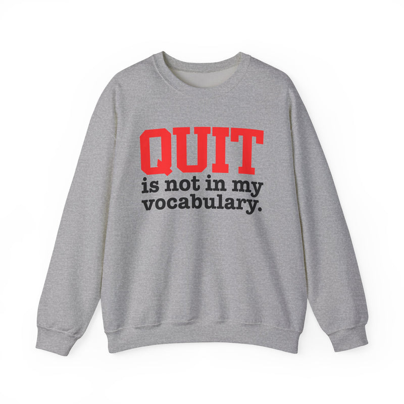 Sport Grey sweatshirt with black and red block lettering reading "QUIT is not in my vocabulary.", front flat-lay view.