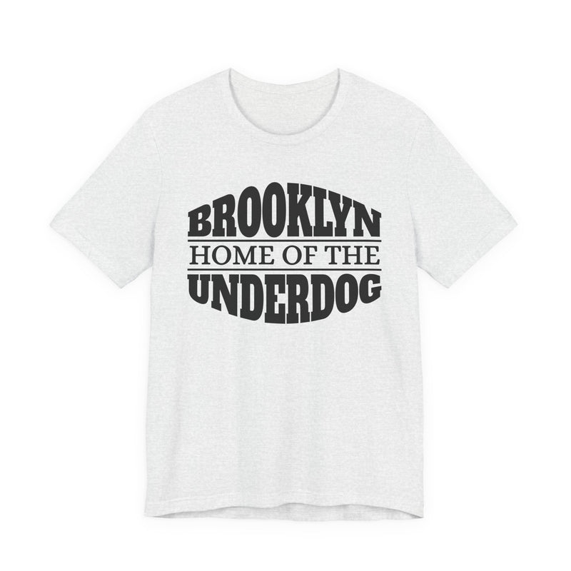 T-shirt with bold lettering reading BROOKLYN (HOME OF THE) UNDERDOG, product view.