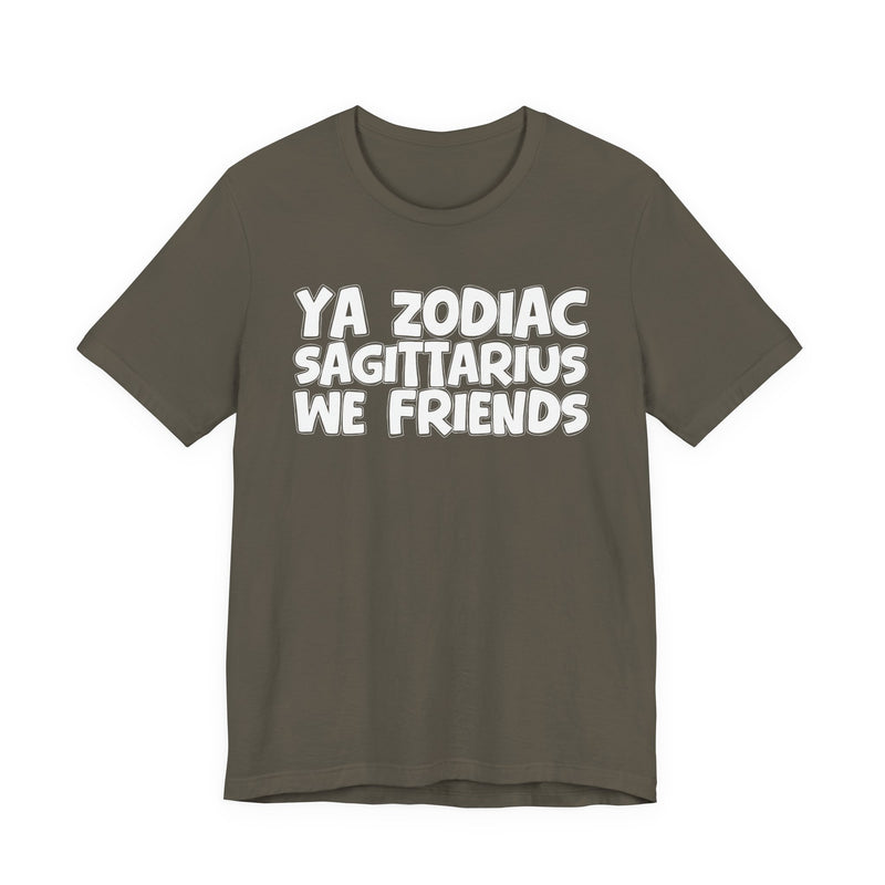 Army t-shirt with white 'YA ZODIAC SAGITTARIUS WE FRIENDS' cartoon bubble lettering, front flat-lay view.