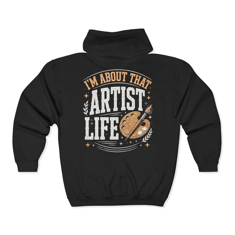 Black hoodie with white and gold bubble lettering reading I'M ABOUT THAT ARTIST LIFE, back view.