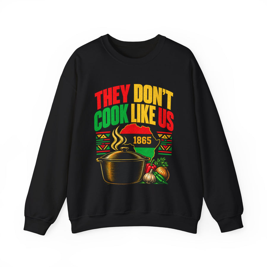 They Don't Cook Like Us — Sweatshirt front view: THEY DON'T COOK LIKE US in bold statement lettering. Street Talk Designs culture statement apparel.