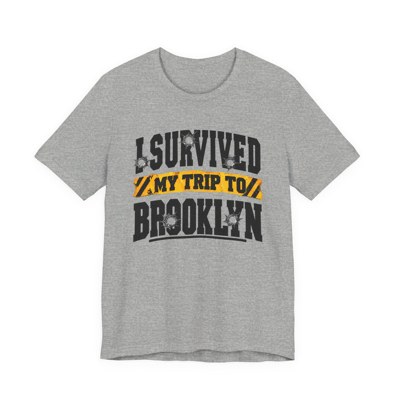 T-Shirt with collegiate lettering reading I SURVIVED MY TRIP TO BROOKLYN, front view.