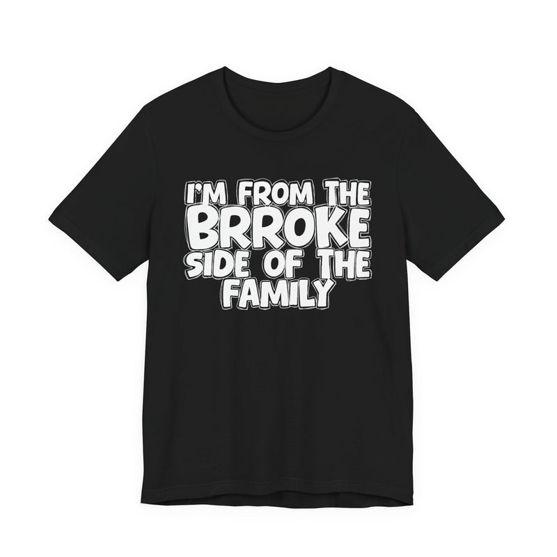 Black t-shirt with 'I'M FROM THE BRROKE SIDE OF THE FAMILY' in white hand-drawn bubble lettering on the chest, front flat-lay mockup view.