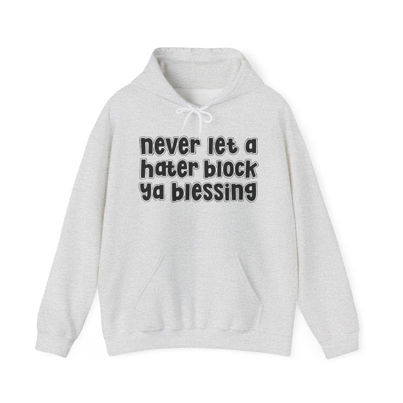 Light Pink hoodie with black outlined bubble lettering reading "never let a hater block ya blessing", front flat-lay view.