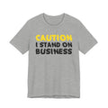 Caution I Stand On Business — Bold Warning Statement Tee