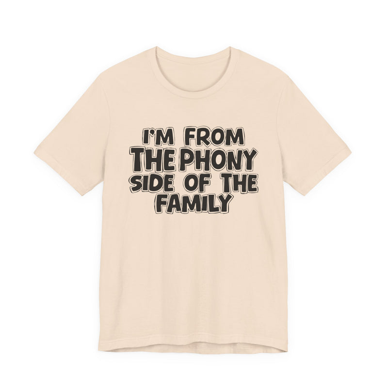 Soft Cream t-shirt with white outlined bubble lettering reading 'I'M FROM THE THE SASSY SIDE OF THE FAMILY', front flat-lay view.