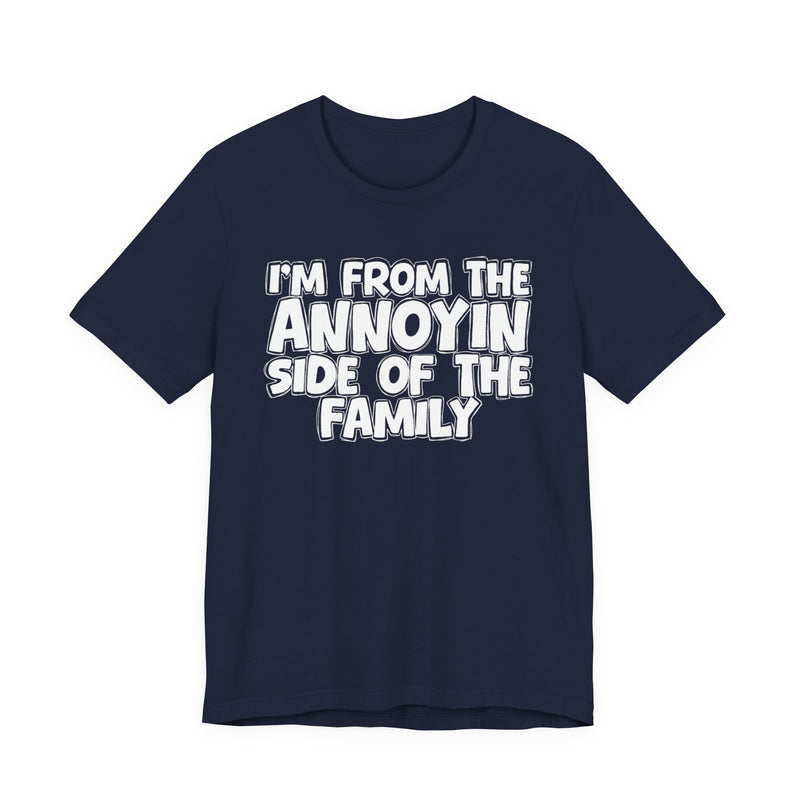 dark t-shirt with ‘I’M FROM THE ANNOYIN SIDE OF THE FAMILY’ statement text in bold outline lettering, front flat-lay view.