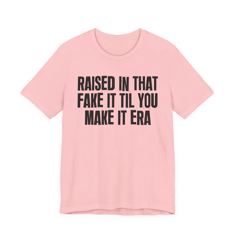 T-Shirt product with lettering reading "RAISED IN THAT FAKE IT TIL YOU MAKE IT ERA", alternate view.