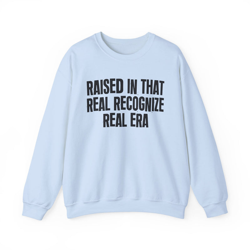 Sweatshirt product with lettering reading "RAISED IN THAT REAL RECOGNIZE REAL ERA", alternate view.