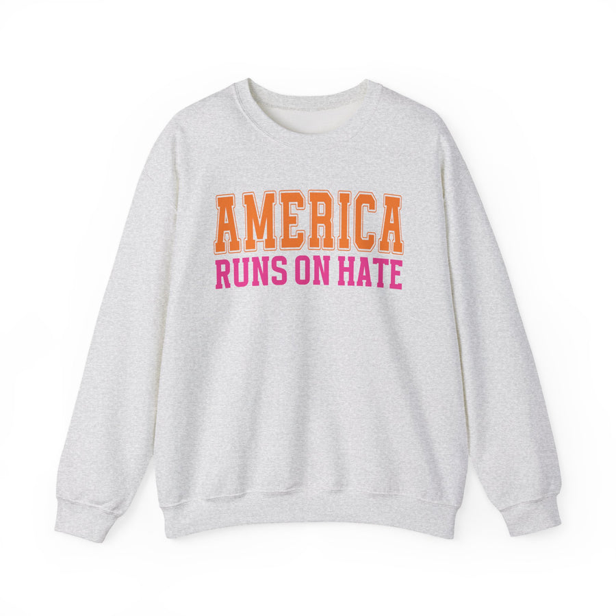 America Runs On Hate — Sweatshirt front view: AMERICA RUNS ON HATE in bold statement lettering. Street Talk Designs politics and power statement apparel.