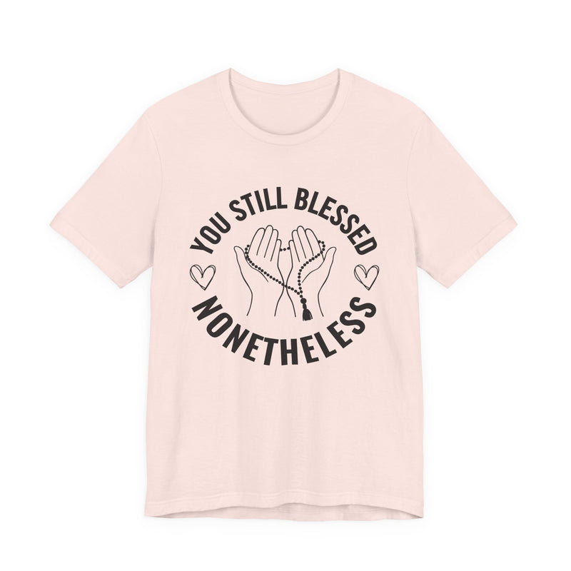 T-Shirt with “YOU STILL BLESSED NONETHELESS” statement print