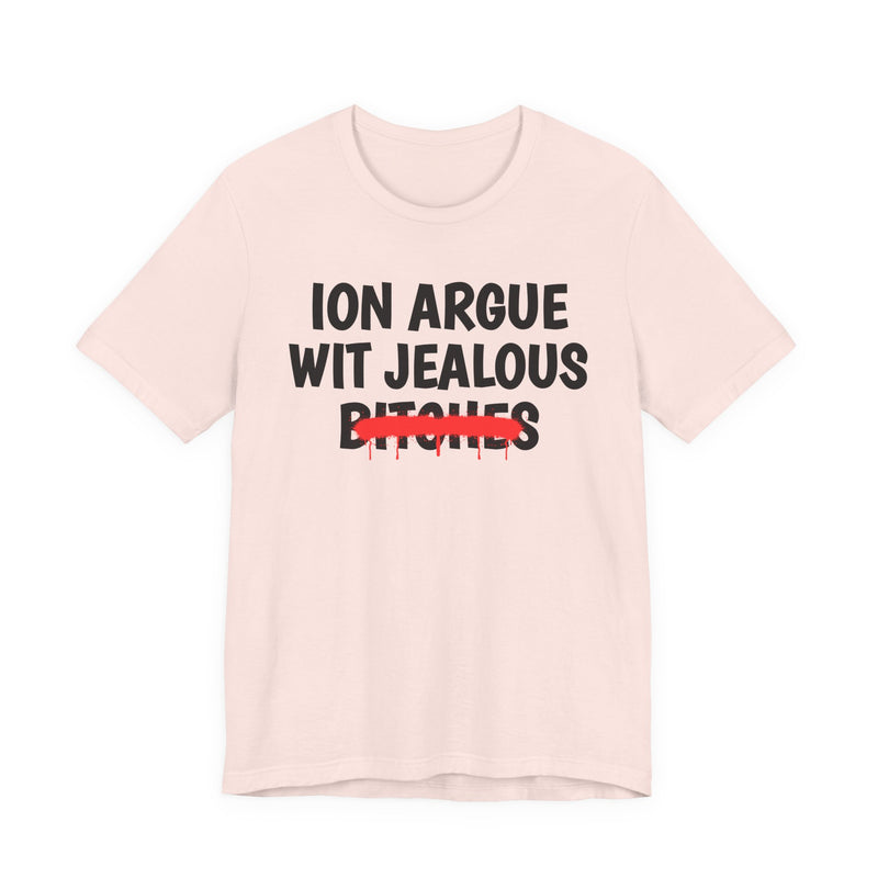 Soft Pink T-shirt with black "ION ARGUE WIT JEALOUS BITCHES" chest print, red spray-paint strike-through across the last line, front flat-lay view.