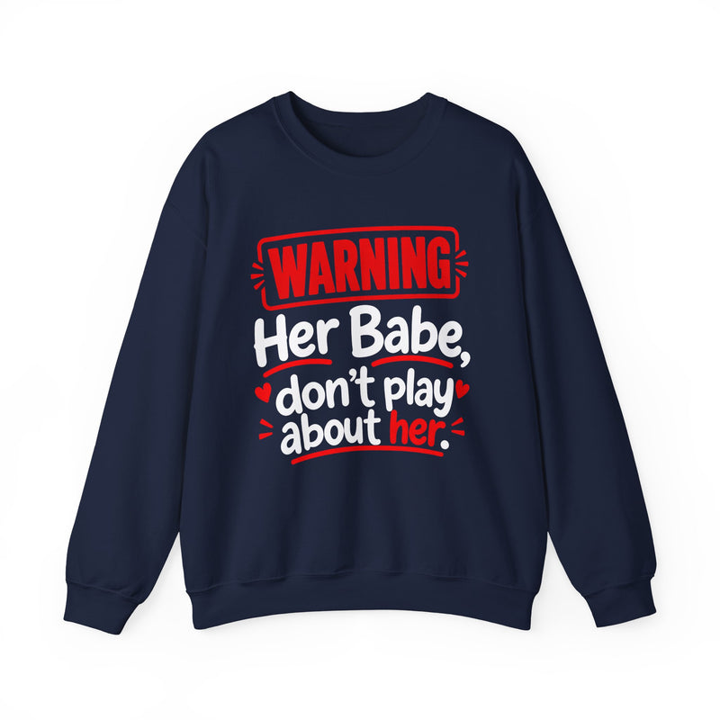 Warning — Her Babe Don’t Play About Her — Sweatshirt fabric detail close-up: lettering reading 'WARNING - HER BABE DON’T PLAY ABOUT HER'. Street Talk Designs family statement apparel.