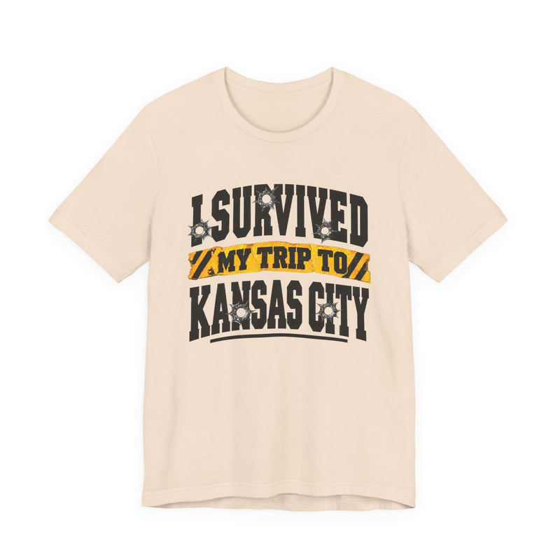 T-Shirt product with collegiate lettering reading I SURVIVED MY TRIP TO KANSAS CITY, detail close-up.