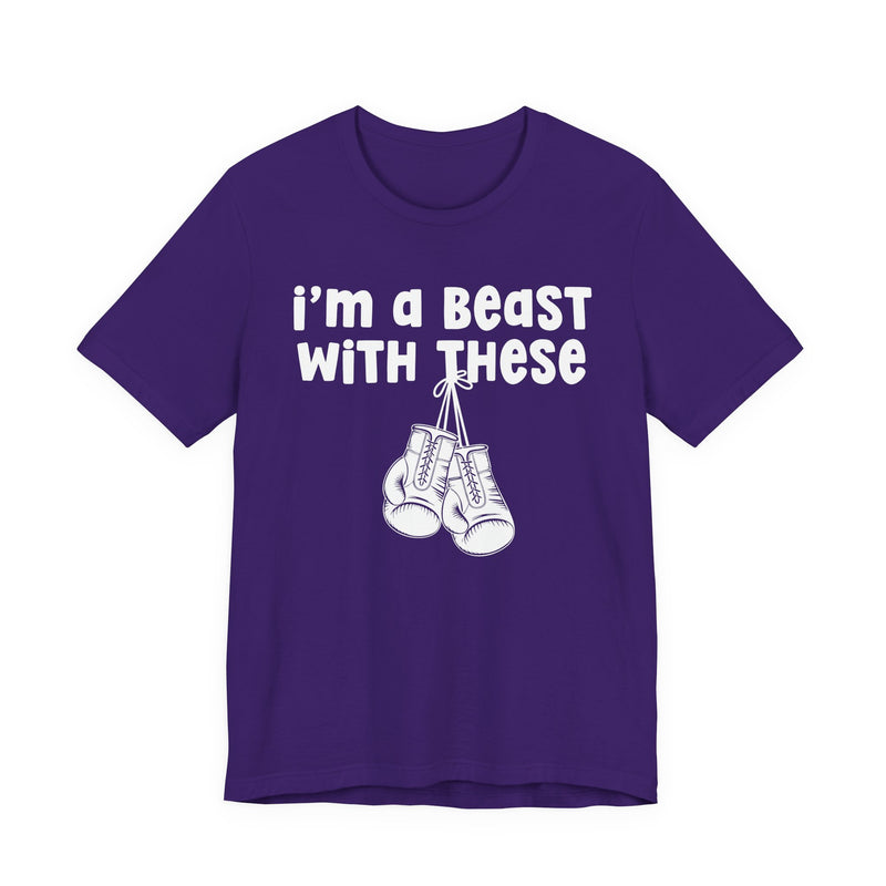 Charcoal t-shirt with boxing gloves and cream collegiate lettering reading I'M A BEAST WITH THESE, flat-lay view.