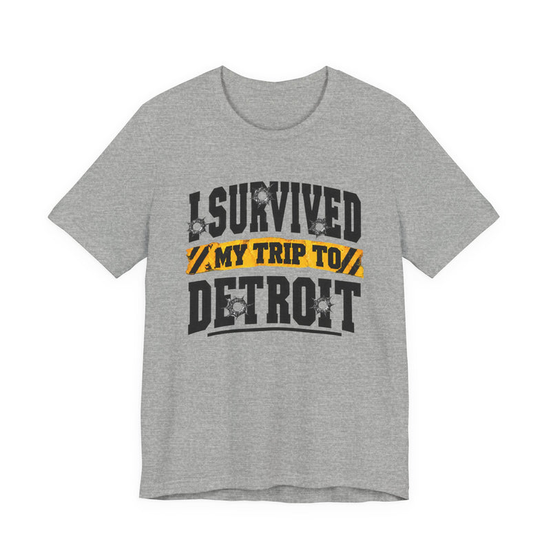 T-shirt with bold lettering reading I SURVIVED MY TRIP TO DETROIT, product view.