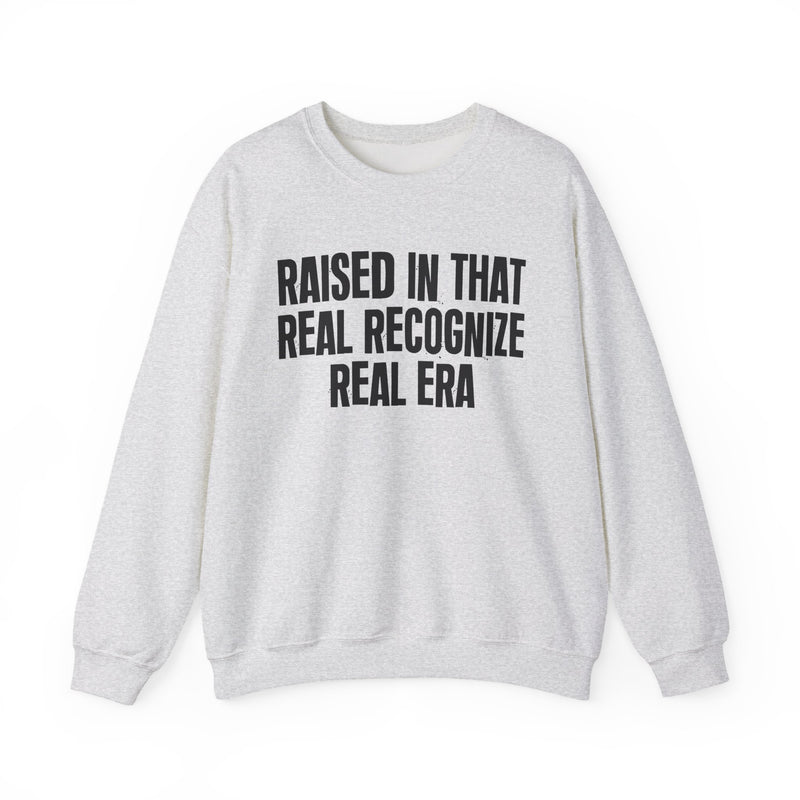 Sweatshirt product with lettering reading "RAISED IN THAT REAL RECOGNIZE REAL ERA", alternate view.
