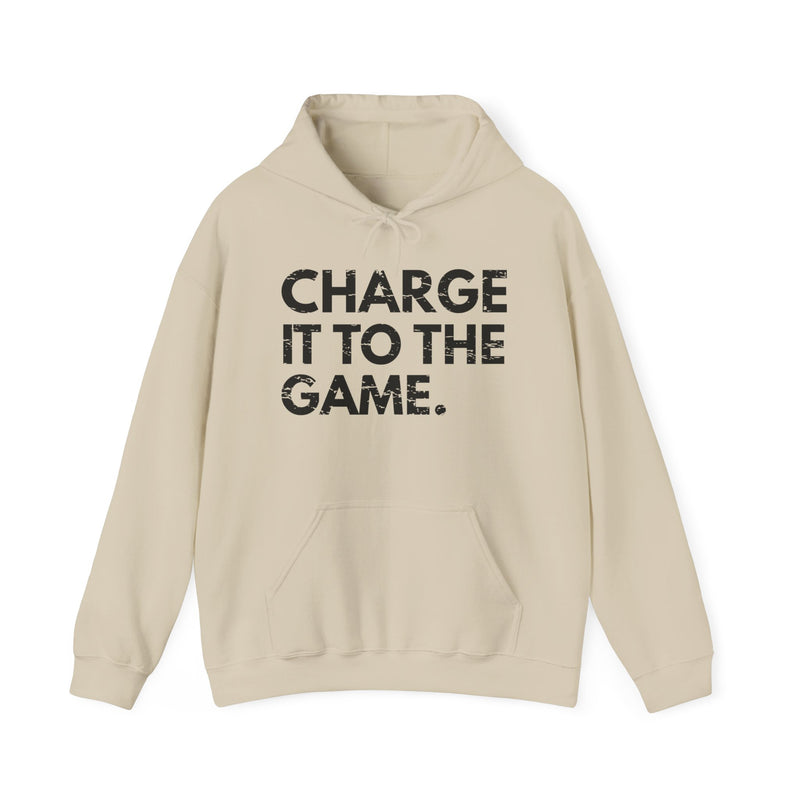 Sand hoodie with black bold statement lettering reading CHARGE IT TO THE GAME, front flat-lay view.