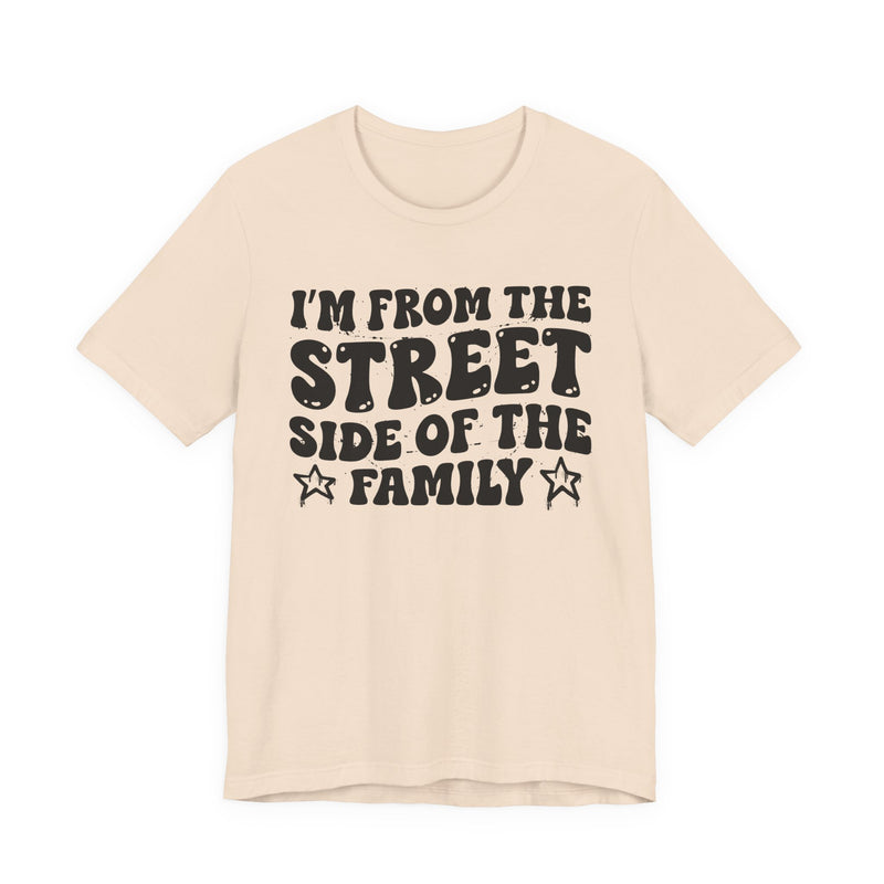 Soft Cream t-shirt with white outlined bubble lettering reading 'I'M FROM THE STREET SIDE OF THE FAMILY', front flat-lay view.