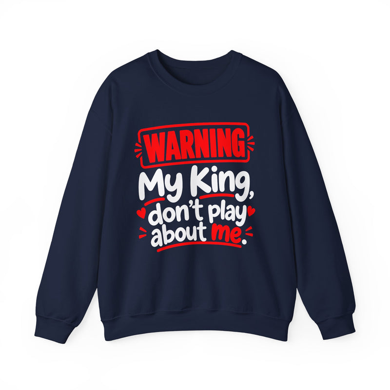 Warning — My King Don’t Play About Me — Sweatshirt fabric detail close-up: lettering reading 'WARNING MY KING DON'T PLAY ABOUT ME'. Street Talk Designs family statement apparel.