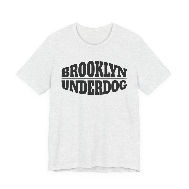 Ash T-shirt with black arched BROOKLYN and inverted-arch UNDERDOG collegiate print, front flat-lay view