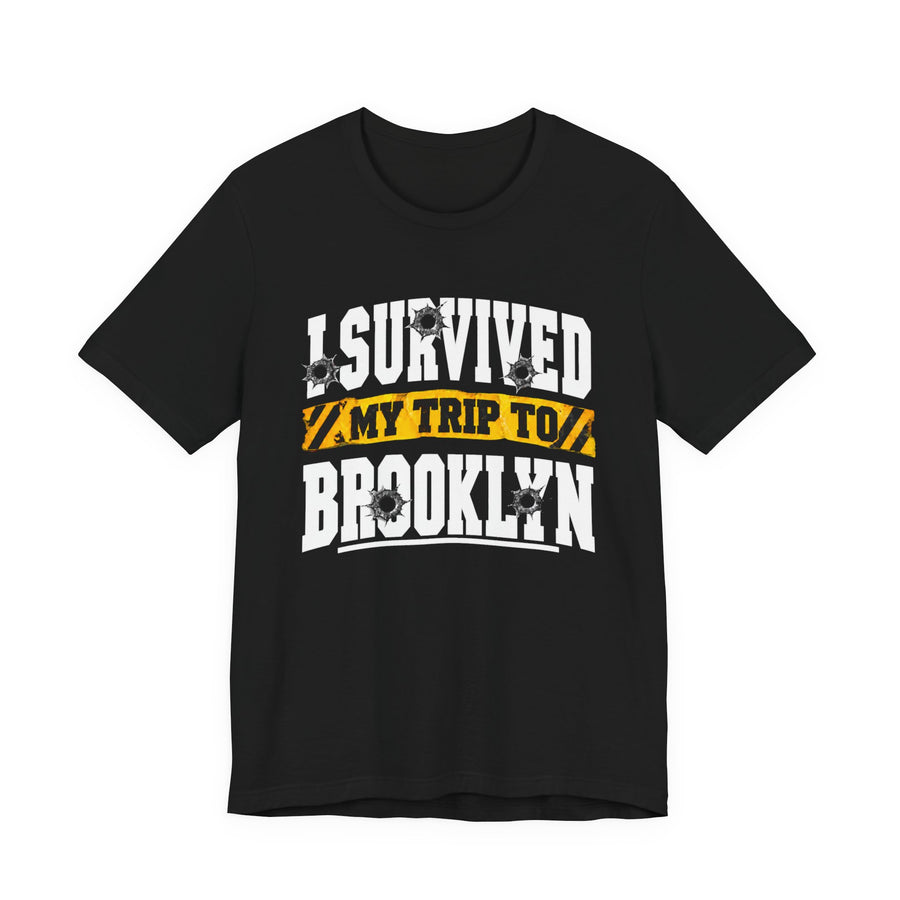 T-Shirt with collegiate lettering reading I SURVIVED MY TRIP TO BROOKLYN, front view.