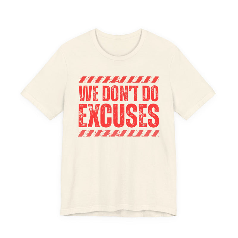 White t-shirt with red bubble lettering reading WE DON'T DO EXCUSES, front view.