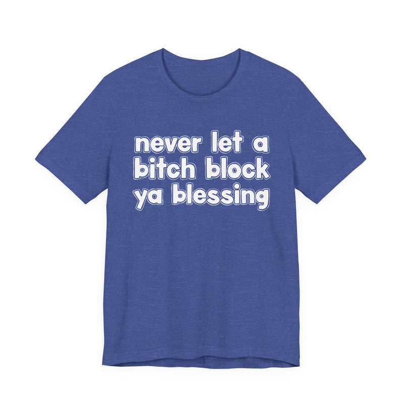 Purple t-shirt with white lettering reading "never let a bitch block ya blessing", front flat-lay view.