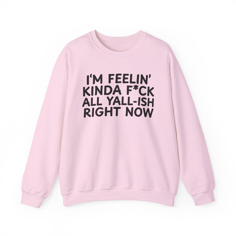 Sweatshirt in Light Pink with lettering reading "I’M FEELIN’ KINDA FUCK ALL YALL ISH RIGHT NOW", front view.