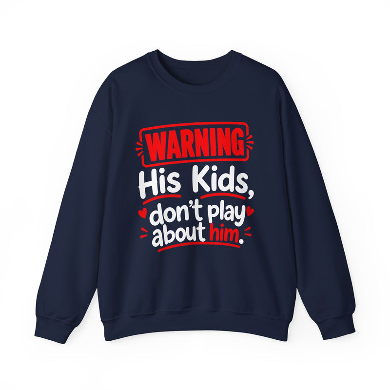 Warning His Kids Don't Play About Him — Sweatshirt fabric detail close-up: lettering reading 'WARNING HIS KIDS DON'T PLAY ABOUT HIM'. Street Talk Designs family statement apparel.