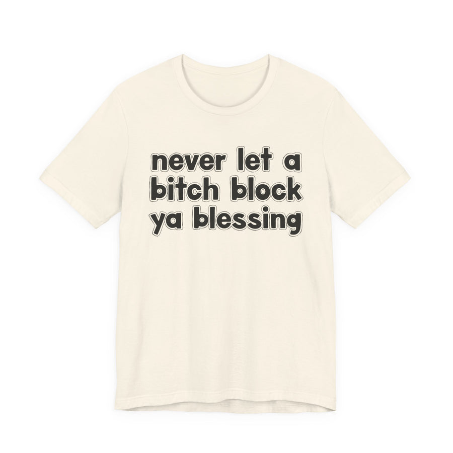 Ash t-shirt with white lettering reading "never let a bitch block ya blessing", front flat-lay view.