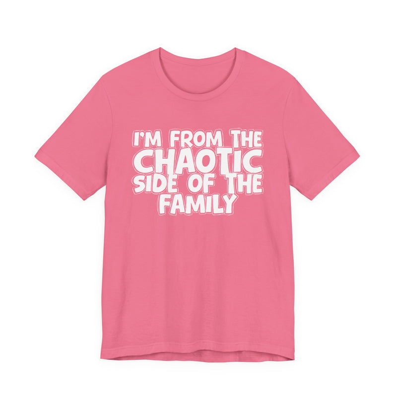 light t-shirt with ‘I’M FROM THE CHAOTIC SIDE OF THE FAMILY’ statement text in bold outline lettering, front flat-lay view.