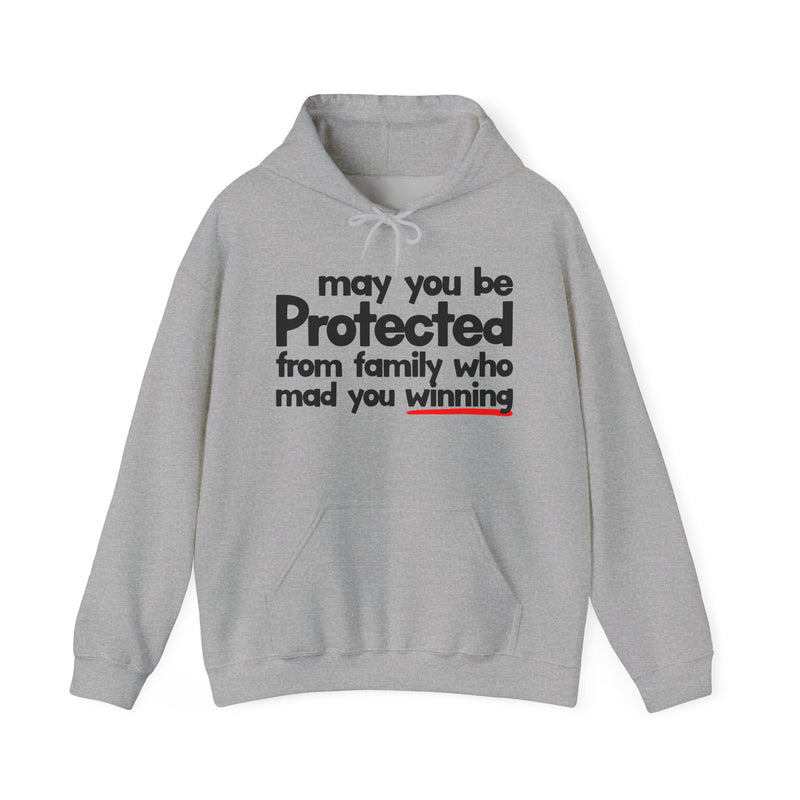 May You Be Protected From Family Who Mad You Winning — Hoodie back view: MAY YOU BE PROTECTED FROM FAMILY WHO MAD YOU WINNING in bold statement lettering. Street Talk Designs protection statement apparel.