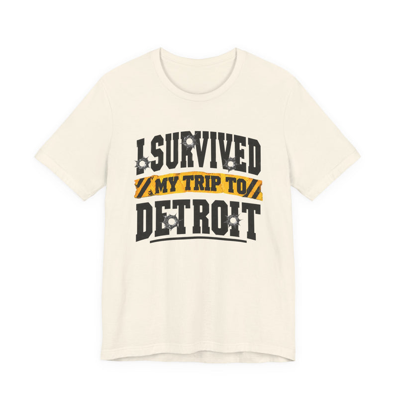 T-shirt with bold lettering reading I SURVIVED MY TRIP TO DETROIT, product view.
