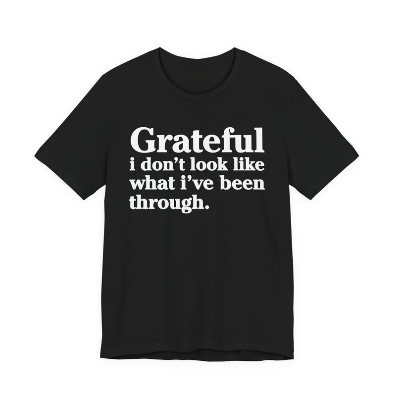 Grateful I Don't Look Like What I've Been Through — Positive Christian T-Shirt