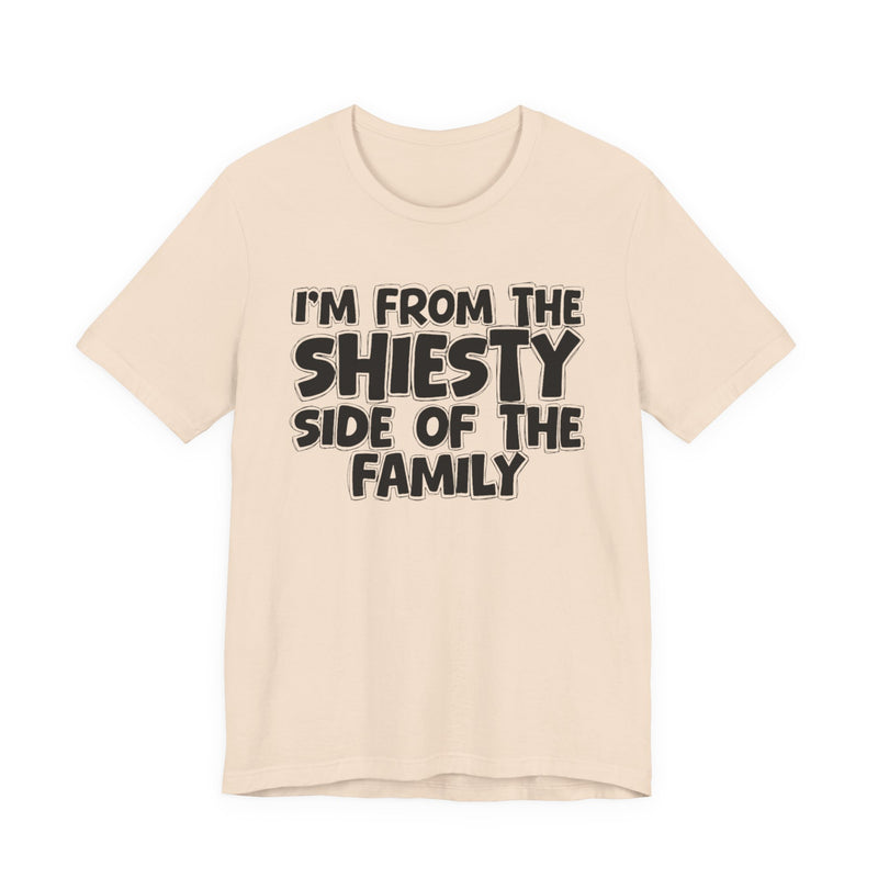 Gold t-shirt with bold chest statement text reading 'I'M FROM THE SHIESTY SIDE OF THE FAMILY,' front flat-lay view.