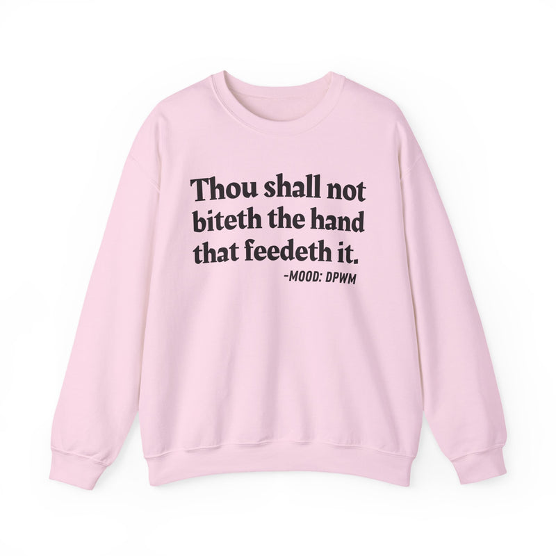 Sweatshirt with text design reading “THOU SHALL NOT BITETH THE HAND THAT FEEDETH IT”, front view
