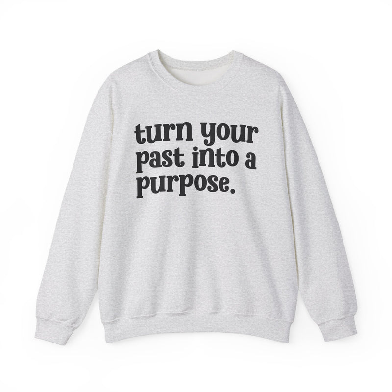 Ash sweatshirt with black "turn your past into a purpose." lettering, front view.