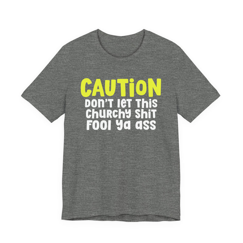 T-Shirt in Deep Heather with lettering reading "CAUTION DON'T LET THIS CHURCHY FOOL YA ASS", front view.