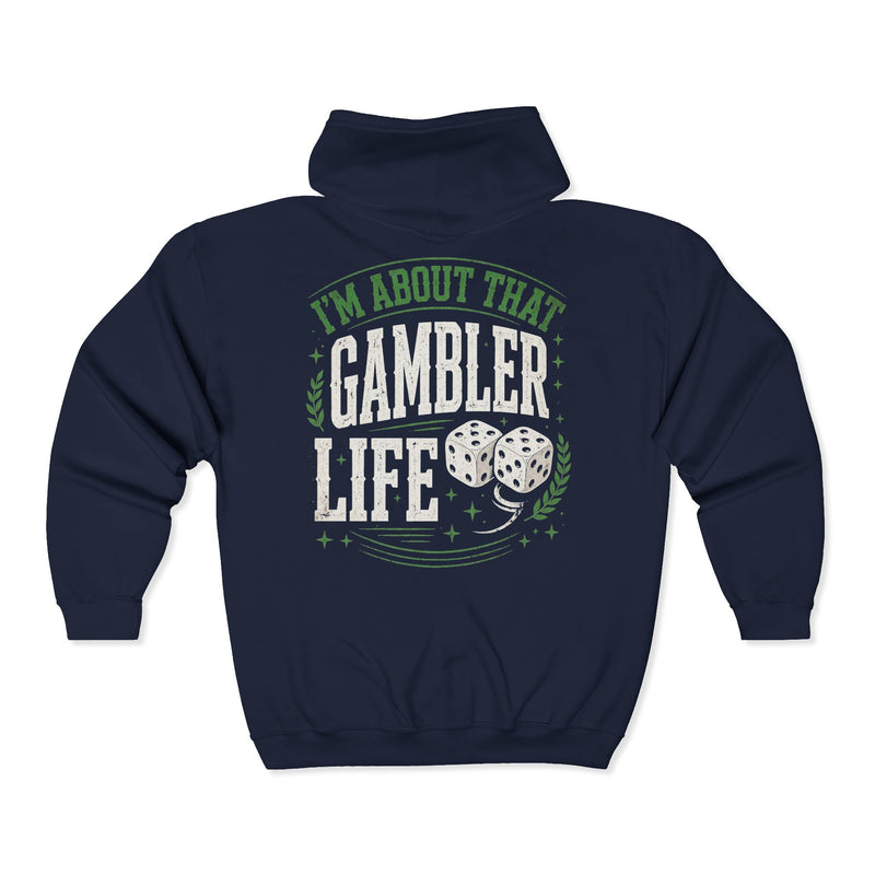 Navy zip hoodie with white and green western lettering reading "I'M ABOUT THAT GAMBLER LIFE", back flat-lay view.