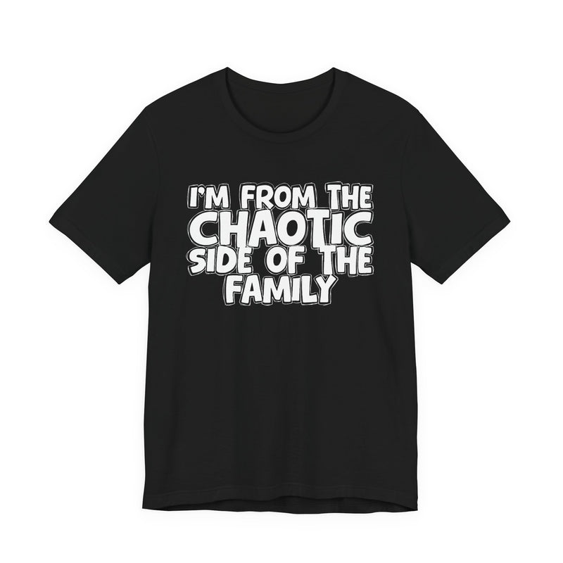 dark t-shirt with ‘I’M FROM THE CHAOTIC SIDE OF THE FAMILY’ statement text in bold outline lettering, front flat-lay view.
